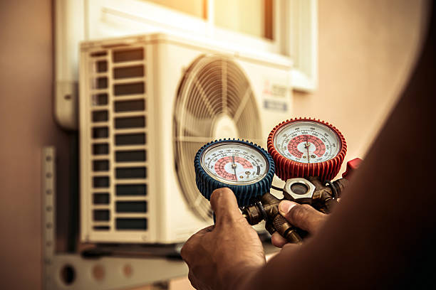 Professional Hvac technician working in Red Oak, IA